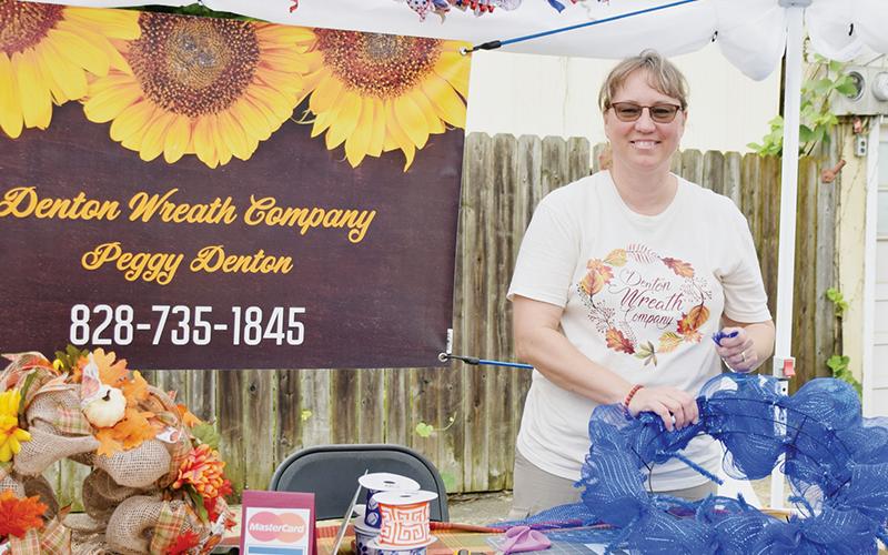 Peggy Denton of Denton Wreath Company was one of many vendors on-hand for the third annual Robbinsville Fall Arts & Crafts Festival on Saturday. Photo by Art Miller/amiller@grahamstar.com