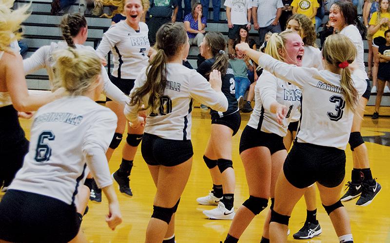 Jubilation sets in for the Robbinsvlle Lady Knights, moments after a thrilling 5-set  victory over Murphy on Sept. 5. Photo by Kevin Hensley/editor@grahamstar.com