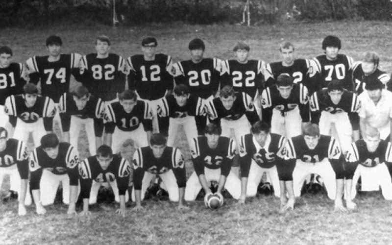 Pictured is the 1970 Robbinsville football team. From left are: Front row: Randal Phillips, Dale Hill, Boes Baker, Kenneth Cody, Ronnie Waldroup, William Collins, Donald George and Dwayne Cable. Second row: Coach Bob Colvin, Jimmy Turner, Barry Millsaps, Randall Burchfield, Roger Anderson, Ricky Davis, Terry Odom, Billy Jenkins, John Paul Wachacha and coach Bergin Edwards. Back row: Tim Brock, Andy Smith, Lowell Snider, Mark Manuel, Jacob Jackson, David Jordan, Larry Sawyer, Dewight Wachacha, Marty George.