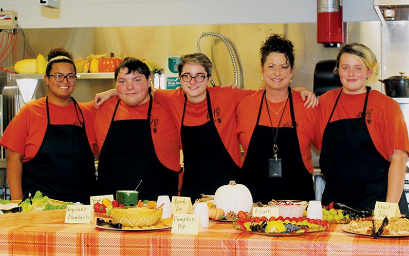 Robbinsville High School students and faculty showed off its new culinary classroom during a recent open house. From left is Brianna Bailey, Jeremiah Jumper, Danielle Bollinger, instructor Lorie Waldroup and Christina Lancaster. Photo by Annette Ensley/Contributing Photographer