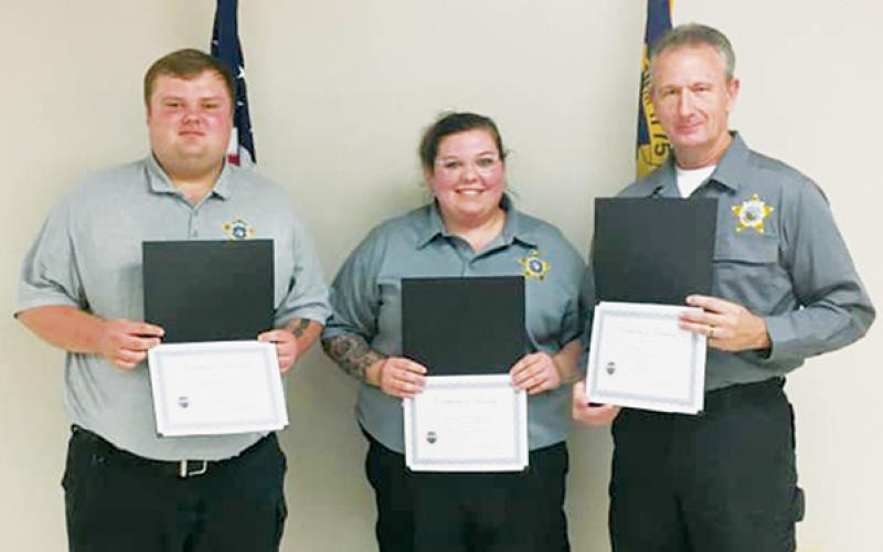 Detention officers Dakota Crisp, Jordan Rogers and Randy Price (from left) recently completed the North Carolina Detention Certification class at Southwestern Community College. Photo courtesy of Graham County Sheriff's Office