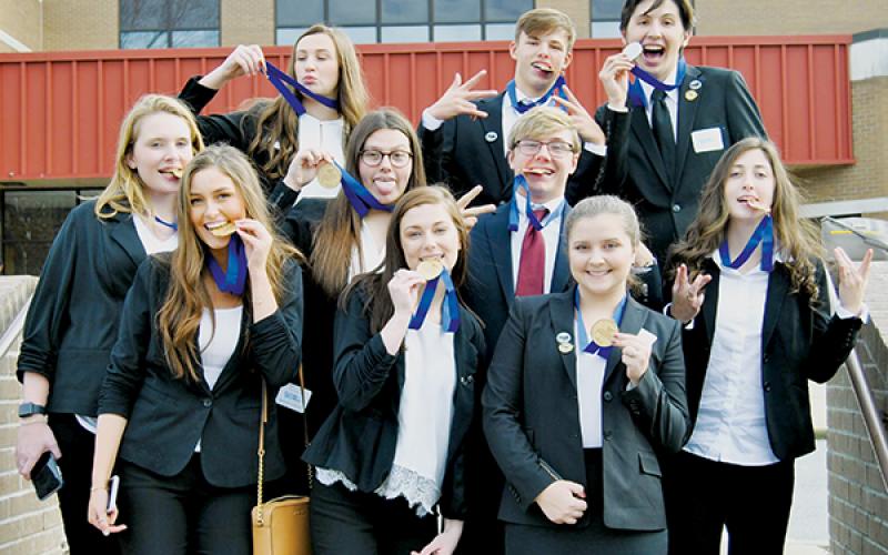 Robbinsville High School’s Health Occupational Students of America club recently competed in the regional competition at Southwestern Community College. Front row (from left) are Tayla Millsaps, Emma Nichols and Leah Cody. Second row (from left) are Alexis McKinney, Lexy Daniels, Colby Lovin and Gabby Hooper. Back row (from left) are Karlyn Matheson, Brock Adams and Bryce Teesateskie. 