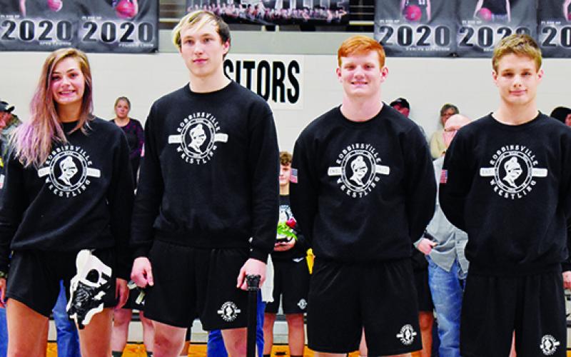 Prior to the Jan. 14 home dual with Andrews, Robbinsville High School wrestling recognized its four seniors (from left): Gracye Burchfield, Justin Stewart, Kamron McGuire and Nathan Fisher. Photo by Kevin Hensley/editor@grahamstar.com