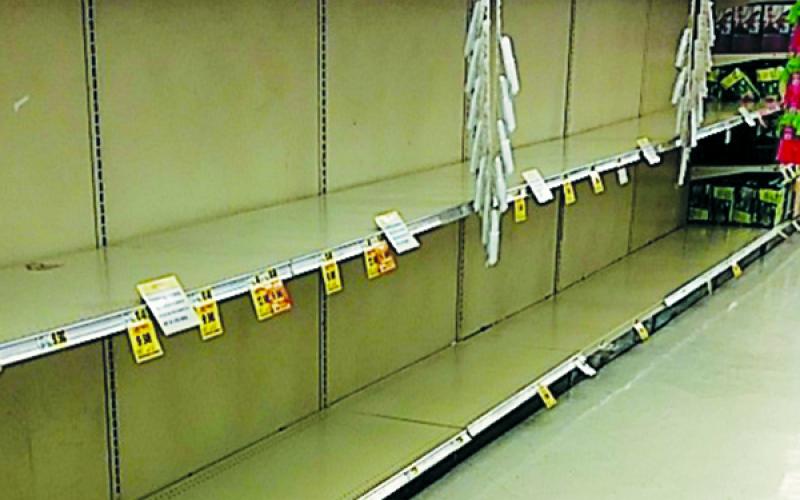 Those in need of toilet paper Tuesday morning would have walked into Robbinsville’s Ingles and found an all-too-familiar site; empty shelves, as customers do their best to stockpile supplies in the wake of the recent coronavirus outbreak. Photo by Hope Riddle/lineads@grahamstar.com