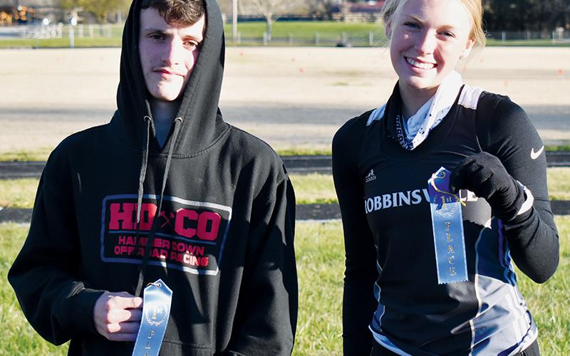 Robbinsville’s Hayden Stewart (left) and Ava Barlow won the respective boys and girls varsity races at the Currahee Classic on Dec. 2. Photo by Kevin Hensley/editor@grahamstar.com