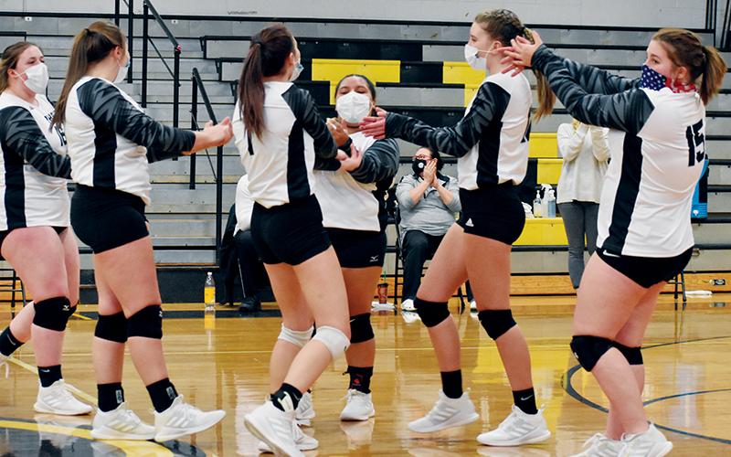 Kylie Farley, Ivy Odom, Delaney Brooms, Tai Owle, Kelsey Waldroup and Abbi Sawyer (from left) celebrate a Sawyer ace during Jan. 7's season finale at Murphy. Photos by Kevin Hensley/editor@grahamstar.com
