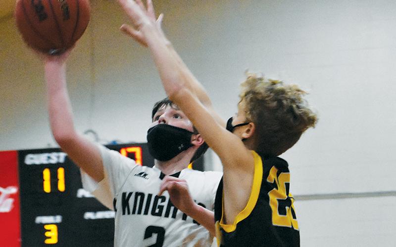 Robbinsville Middle School’s Roman Jones eyes a basket during a home game against Murphy on Jan. 25. Photo by Kevin Hensley/editor@grahamstar.com