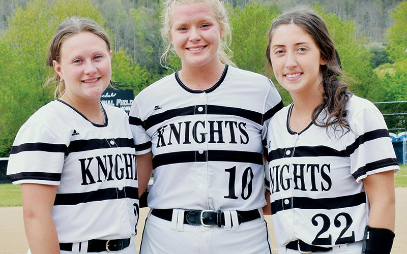 Prior to April 29’s game against Hayesville, the Robbinsville Lady Knights recognized their three softball seniors (from left): Sydney Farley, Maggie Knight and Gabby Hooper.