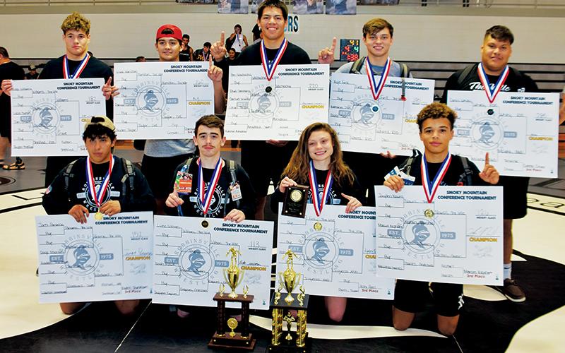 The Robbinsville Black Knights won nine of the 14 weight classes contested in June 10’s Smoky Mountain Conference tournament. All names are listed from left. Kneeling in front are Jaret Panama (152 pounds), Luke Wilson (113), Aynsley Fink (106) and Jayden Nowell (126). Standing in back are Kage Williams, Wade Hamilton, Ben Wachacha, Kyle Fink and Carlos Wesley. Photo by Art Miller/amiller@grahamstar.com