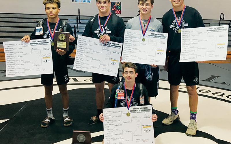 Five Robbinsville grapplers won the 1A Western Regional Championship on their home mat Tuesday. Kneeling in front is Luke Wilson. Standing in back is Jayden Nowell, Kage Williams, Kyle Fink and Ben Wachacha (from left). Photo by Kevin Hensley/sports@grahamstar.com