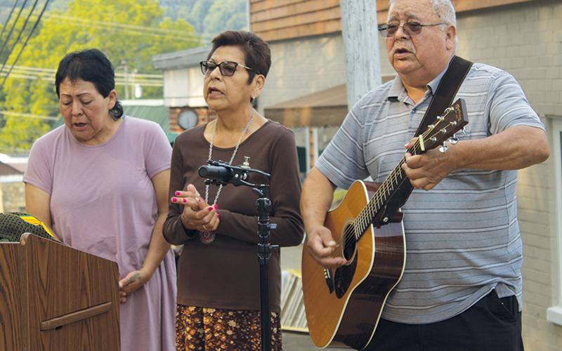 Vicki Sluder, Maybelle Welch and Adam Welch (from left) perform together at the dedication Saturday.