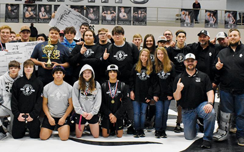 Members of the Robbinsville High School wrestling team gather at center mat Saturday to celebrate its 2022 James Orr Invitational victory. Photos by Kevin Hensley/sports@grahamstar.com