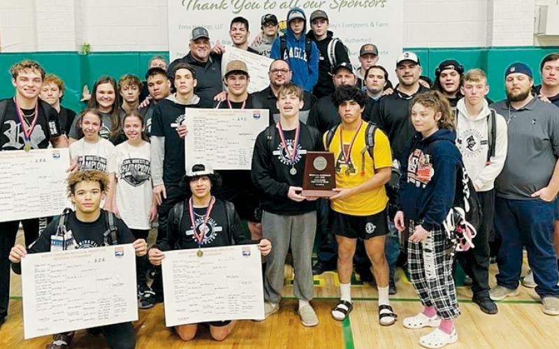 Members of the Robbinsville High School wrestling program gather with the 1A Western Regional Individual Runner-Up plaque, at the conclusion of the two-day tournament at Alleghany. Photos by Susan Crowe/Contributing Photographer