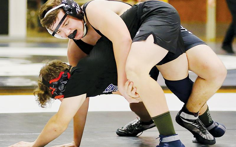 Robbinsville’s Murphy Shanahan wrangles his opponent to the mat during Monday’s first-round postseason dual against Langtree Charter Academy. Photo by Miranda Buchanan/Robbinsville High School Yearbook