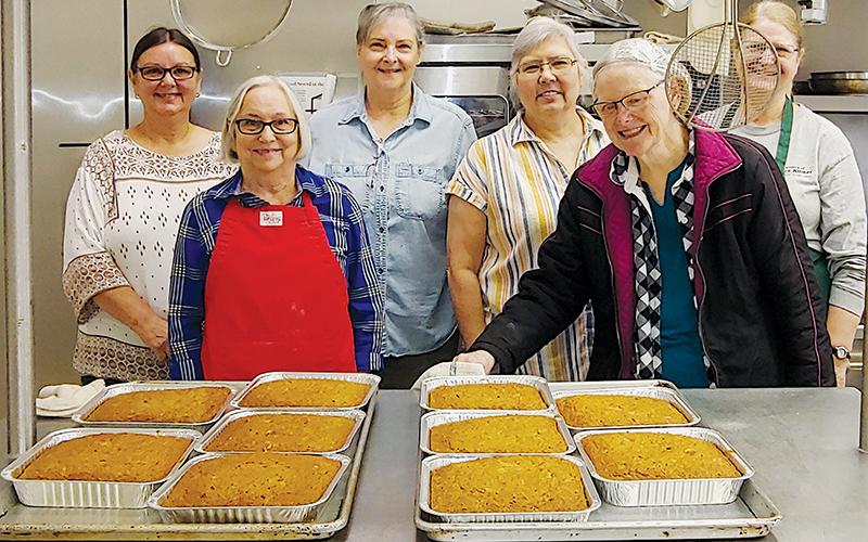 Phyllis Hoffman, Bonnie Dodson, Tere Moore, Eileen Kallmayer, Nancy Norcross and Victoria Baker (from left) pose with some of the goods they baked at Stecoah Valley Cultural Arts Center for the Graham County Women’s Club Easter Bake Sale. Photo courtesy of Sherri Orr/Graham County Women's Club