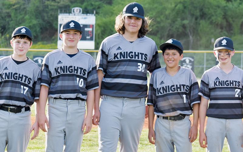 After Tuesday’s games against Hiwassee Dam/Ranger, Robbinsville Middle School recognized its eighth-grade baseball and softball athletes. For the Black Knights: Tripp Beasley, Luke Lovin, Dane Daniels, Tyler Martinez and Everett Taylor (from left). 