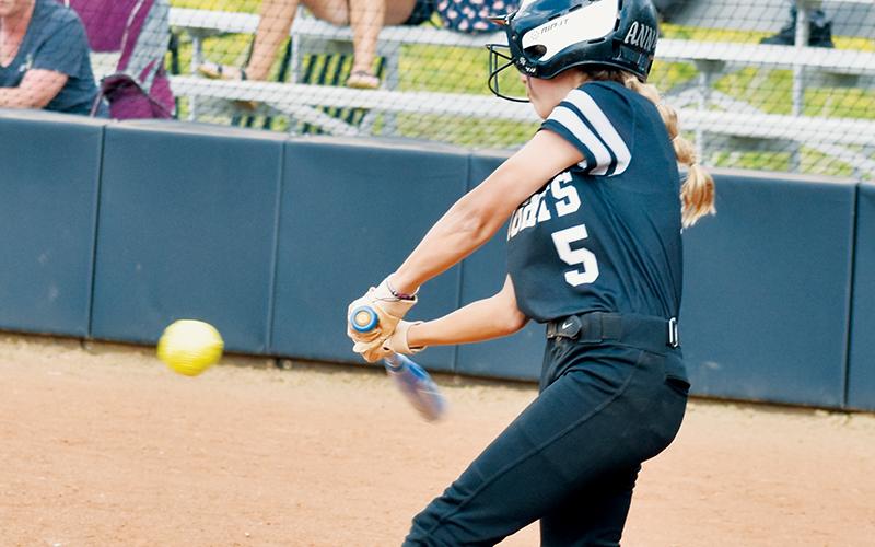 Middle school Lady Knight Anna Williams prepares to drive the ball May 3 against Hiwassee Dam/Ranger. Williams unleashed a 3-run homer Friday, aiding Robbinsville immensely in a 20-6 drubbing of the previously-unbeaten Cherokee Lady Braves. Photo by Kevin Hensley/sports@grahamstar.com