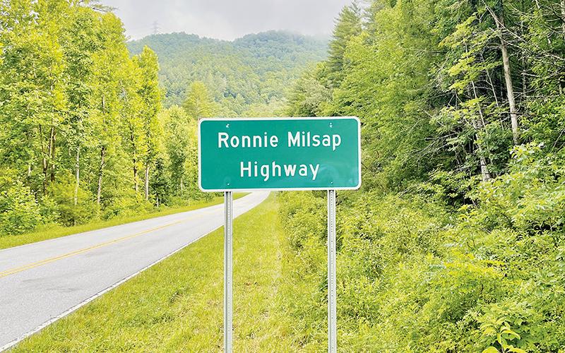 Two signs identifying Ronnie Milsap Highway were installed on U.S. Hwy. 129, one near Yellow Creek Road (pictured here) and the other near Meadow Branch Road, not far from the community where Milsap spent some of his childhood. Photo by Randy Foster/news@grahamstar.c