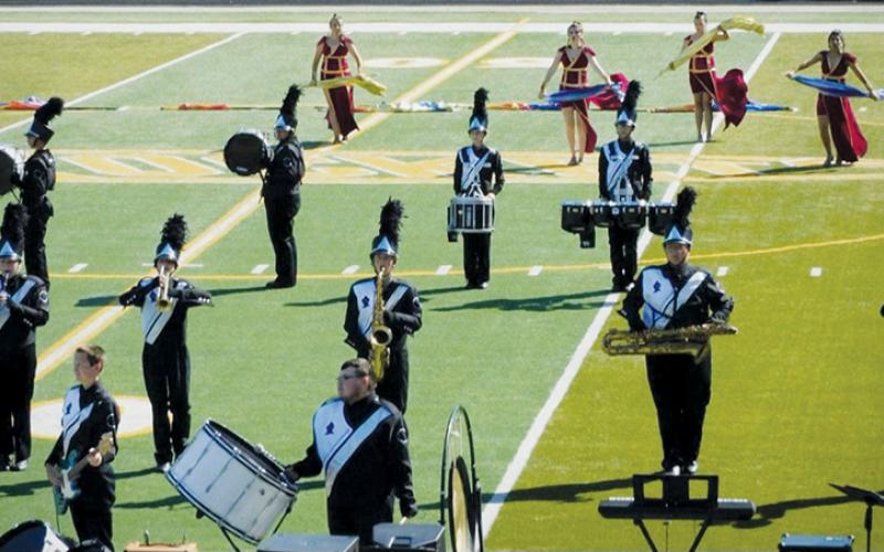 The Black Knights Marching Band performs its 2022 show, “Valhalla,” at A.C. Reynolds’ Cedar Cliff Classic on Oct. 8 in Asheville. The regiment has been turning heads all year with its spirited performances and a wave of enthusiasm – and the hard work has paid off with numerous accolades collected at two competitions. Photos courtesy of Robbinsville High School Band