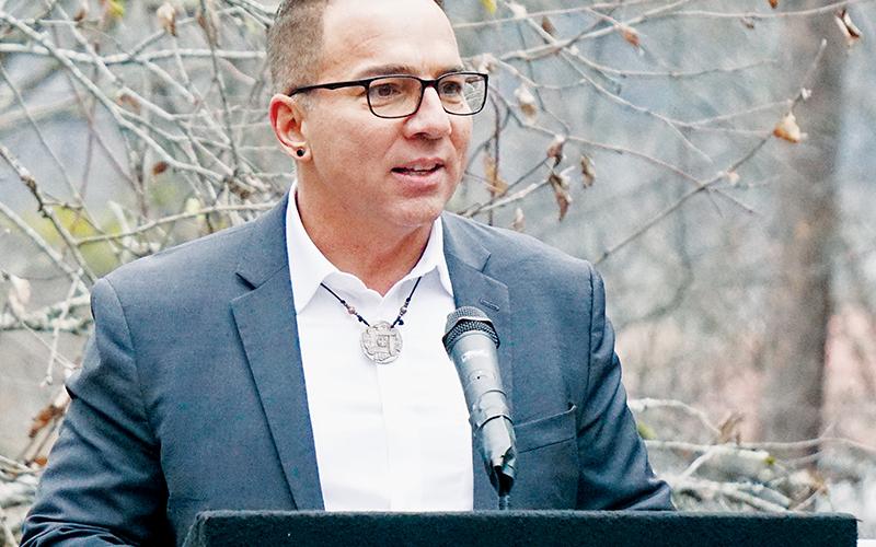 Richard Sneed, principal chief of the Eastern Band of Cherokee Indians, delivers opening remarks during Nov. 16’s wreath-laying ceremony at the Junaluska burial site.