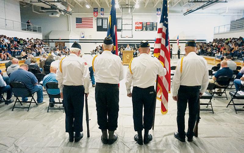 Veterans of Foreign Wars Post 8636 and American Legion Post 192 provide a color guard at Robbinsville High School’s Veterans Day ceremony Nov. 10. Photo by Randy Foster/news@grahamstar.com