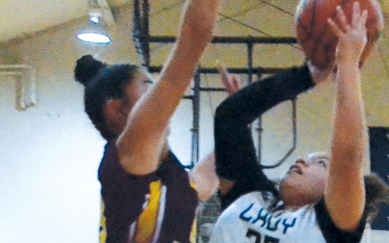 Zirriyah Wachacha drives to the basket Dec. 5 against Cherokee. Photo by Kevin Hensley/sports@grahamstar.com