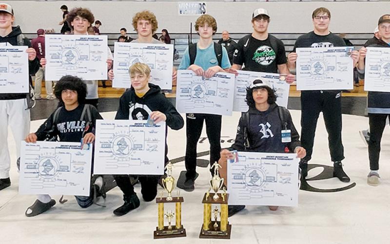 Robbinsville’s 10 Smoky Mountain Conference champions gather after Saturday’s tournament. All names are listed from left. Front row: Adair Panama, Bobby Moore and Alexis Panama. Back row: Blake Powers, Christian Phillips, Turner Jackson, Loxston Hooper, Kage Williams, Koleson Dooley and Willie Riddle. Photo courtesy of Susan Crowe
