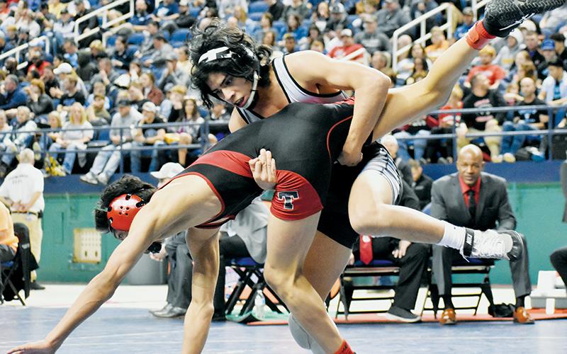 Alexis Panama attained his only pinfall victory of the state  tournament when it mattered most: the finals, as he pinned Thomasville’s Josue Gomez in the second period to snag the 113-pound gold medal.