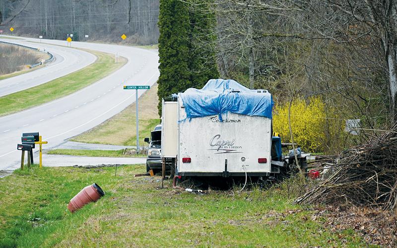 A resident parked this Coachmen RV on the side of N.C. Hwy. 28 in the Wolf Creek community over a month ago, raising the ire of neighbors due to its questionable setup.