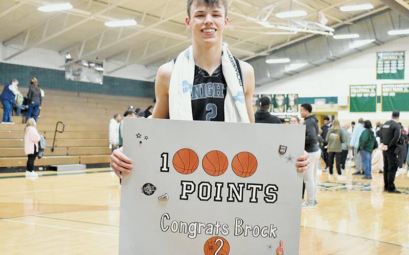 A foul shot late in Saturday’s third-round playoff game at Eastern Randolph gave Robbinsville senior Brock Adams his 1,000th career point. He finished his Black Knights run holding steady to the tally. Photo by Kevin Hensley/sports@grahamstar.com