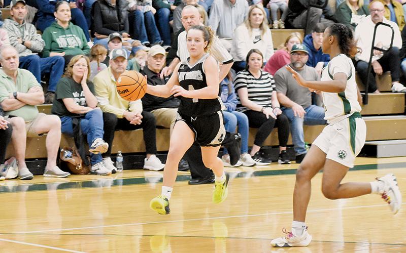 Robbinsville senior Desta Trammell cuts toward the basket Saturday at Eastern Randolph. Trammell eclipsed the 1,900-point mark in her career in the Lady Knights' third-round triumph. Photo by Montana Buchanan/The Graham Star