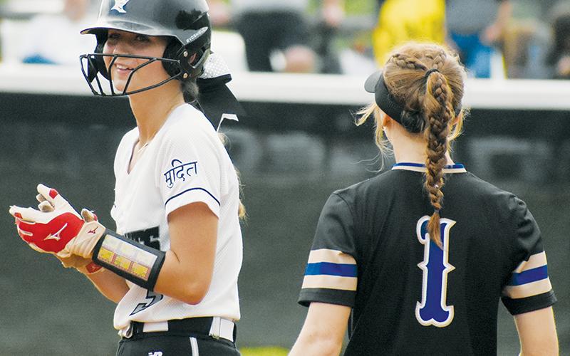 Memory Frapp cracks a smile after roping the Lady Knights’ lone extra-base hit against Elkin – a 5th-inning double – May 11.
