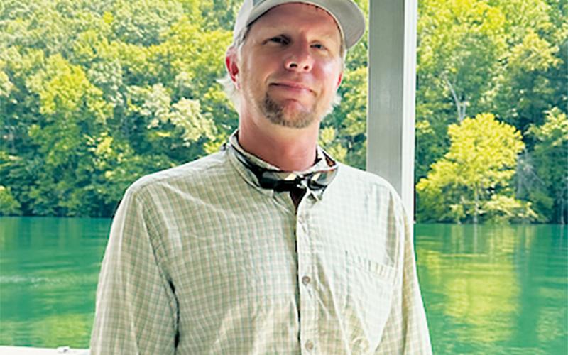 Fontana Village Marina Manager Brandon Jones was recently named a recipient of the North Carolina Wildlife Federation’s annual Governor Conservation Achievement Award. Photo by Latresa Phillips/The Graham Star