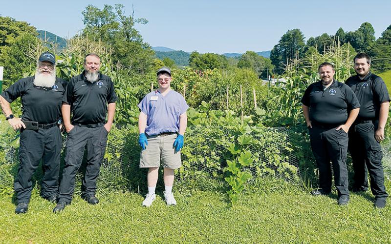 After a lot of brainstorming, ground was first broken on the Graham County EMS  garden earlier this year. From left are Bob Keber, Travis Chastain, David Maennle, Drew Silvers and Cameron Wiggins. Photos by Latresa Phillips/The Graham Star