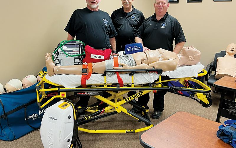 Paramedic Jay Chastain, EMT Jon Marsh and Graham County EMS Captain/Paramedic Leon Allen (from left) stand with several recent purchases the county has made to better serve first responders when called into service. In totality, the items pictured are worth over $80,000. Photos by Kevin Hensley/editor@grahamstar.com