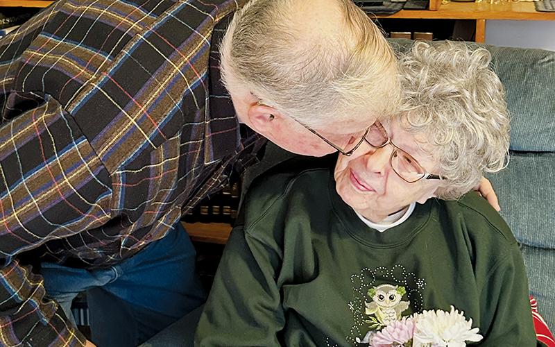 No matter the age, G.D. Phillips and Blaze Powers have already solved one equation: there is never a bad time to give flowers to their respective wives, Woody and Aubrey. Photos by Latresa Phillips/The Graham Star