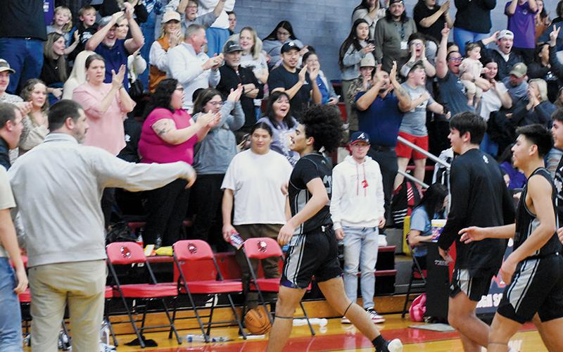 The Black Knights erupt, moments after Robbinsville’s Darion Ledbetter hit the buzzer-beating winner Friday at Andrews. Photos by Kevin Hensley/sports@grahamstar.com