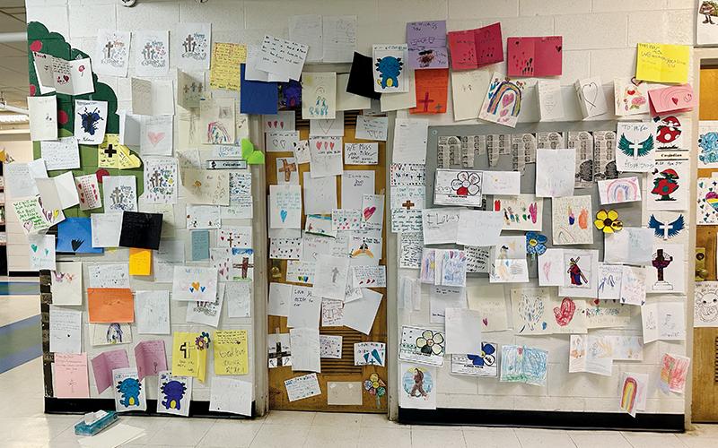 The passing of beloved Robbinsville Elementary School custodian Mike Hyde ushered in a bevy of tributes. Here, a wall on the 4th/5th grade hallway surrounding his work closet is filled with cards from students who will always remember “Mr. Mike.” Photo by Latresa Phillips/The Graham Star