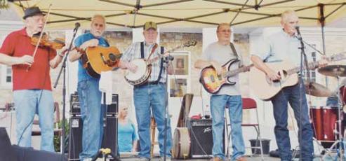 The Fontana Ramblers perform during Music on the Square in downtown Robbinsville on Friday.