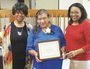 Snowbird resident Onita Bush (center) was presented with the One Dozen Who Care’s Community Treasure Award on Saturday, Nov. 9. With Bush is organization founder Ann Miller Woodford and director Dawn Colbert.