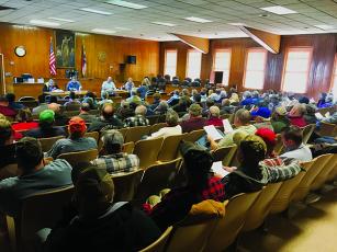 Heavy public interest in the Town of Robbinsville meeting on Jan. 8 – originally believed to be the session a resolution that would allow alcohol sales to appear on the next ballot – forced a last-minute relocation to the nearby Graham County Courthouse. Photo by Kevin Hensley/editor@grahamstar.com