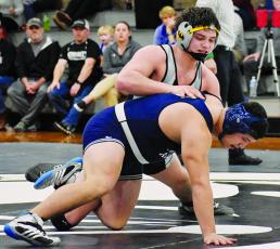 Robbinsville’s Kyle Fink controls Mount Airy’s Eric Olvera during the second round of the 1A state duals on Feb. 4. Photo by Kevin Hensley/editor@grahamstar.com