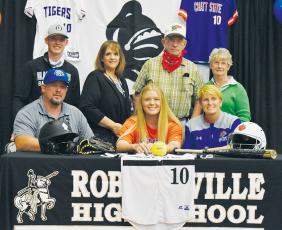 Robbinsville’s Maggie Knight (seated, center) signed her letter of intent to play softball at Chattanooga State on Tuesday, Nov. 10. Sitting with Maggie is father Billy and mother Joanne Knight. Standing in back (from left) are cousin Alex Knight, aunt Angie Knight, and grandparents Randy and Velvie Knight. Photo by Kevin Hensley/editor@grahamstar.com