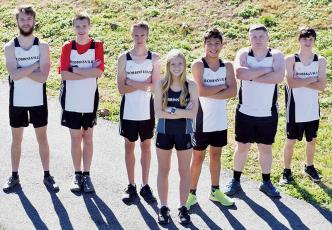 The 2020-21 Robbinsville High School cross-country team consists of (from left): Sully Shanahan, Zeb Stewart, William Cable, Ava Barlow, Xander Wachacha, Phoenix Brooks and Hayden Stewart. Photo by Kevin Hensley/editor@grahamstar.com