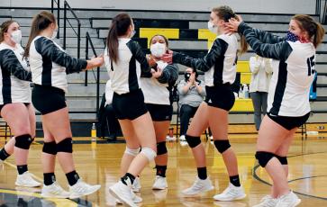 Kylie Farley, Ivy Odom, Delaney Brooms, Tai Owle, Kelsey Waldroup and Abbi Sawyer (from left) celebrate a Sawyer ace during Jan. 7's season finale at Murphy. Photos by Kevin Hensley/editor@grahamstar.com