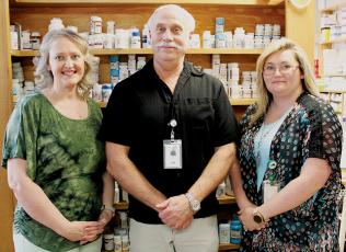 Pharmacy technician Tammy Creasman, pharmacist David Mosteller and certified pharmacy technician Tonya Howell (from left), in their workspace at the Tallulah Pharmacy, located inside the Tallulah Health Center. Not pictured is certified pharmacy technician Lacy Hamilton. Photos by Charlie Benton/news@grahamstar.com