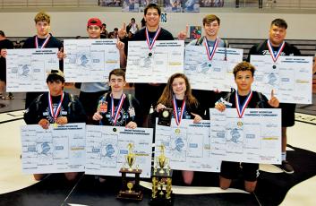 The Robbinsville Black Knights won nine of the 14 weight classes contested in June 10’s Smoky Mountain Conference tournament. All names are listed from left. Kneeling in front are Jaret Panama (152 pounds), Luke Wilson (113), Aynsley Fink (106) and Jayden Nowell (126). Standing in back are Kage Williams, Wade Hamilton, Ben Wachacha, Kyle Fink and Carlos Wesley. Photo by Art Miller/amiller@grahamstar.com