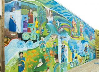 A mural in downtown Robbinsville – depicting matriarchs of the  Snowbird Community – was dedicated in a ceremony Saturday. Photos by Charlie Benton/news@grahamstar.com