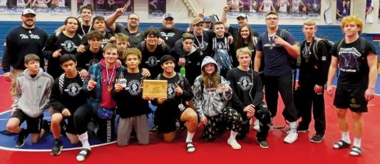 Members of the Robbinsville wrestling program pause after winning the 2021 Falcon Frenzy in Hendersonville. Photo courtesy of Susan Crowe