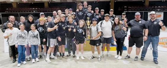 Members of the Robbinsville wrestling program pose with the 2021 Great Smoky Mountain Grapple tournament championship after Saturday's triumph in Asheville. The Knights have won two tournaments in a row. Photo courtesy of Susan Crowe/Contributing Photographer